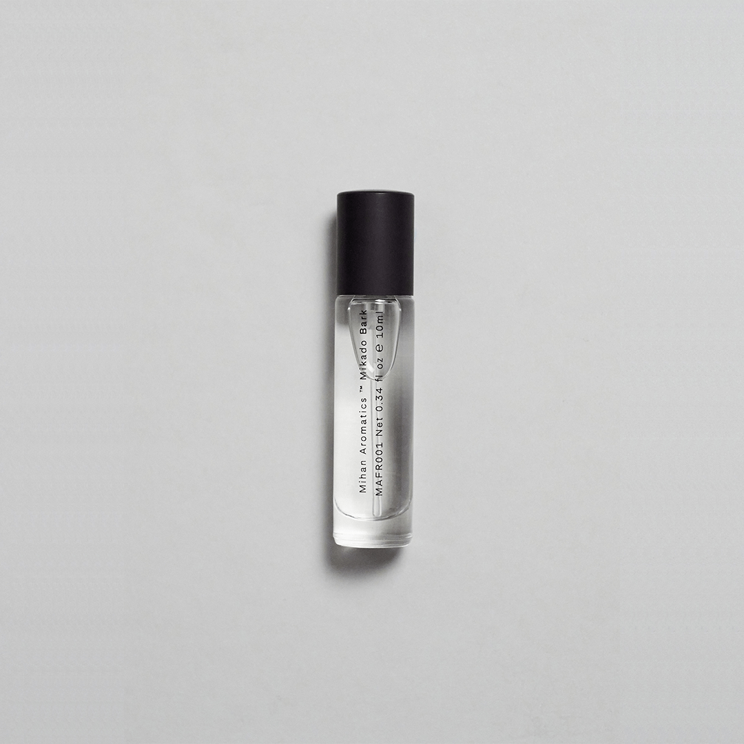 Mikado Bark Parfum bottle on a neutral background, reflecting the calm essence of autumn.