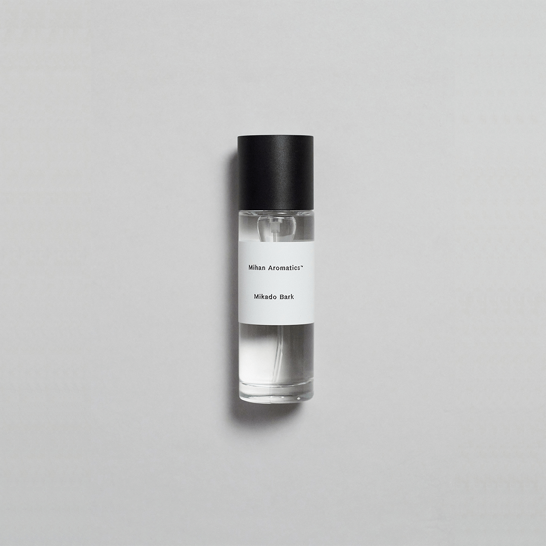 Mikado Bark Parfum bottle, showcasing crisp air and autumn park ambiance in a minimalist design.
