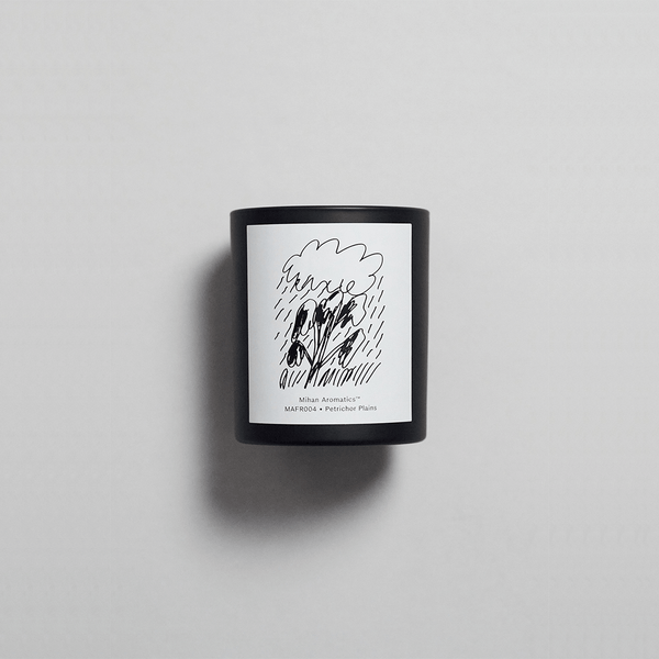 Petrichor Plains Candle by Mihan Aromatics, hand-poured soy wax candle with a unique artistic label.