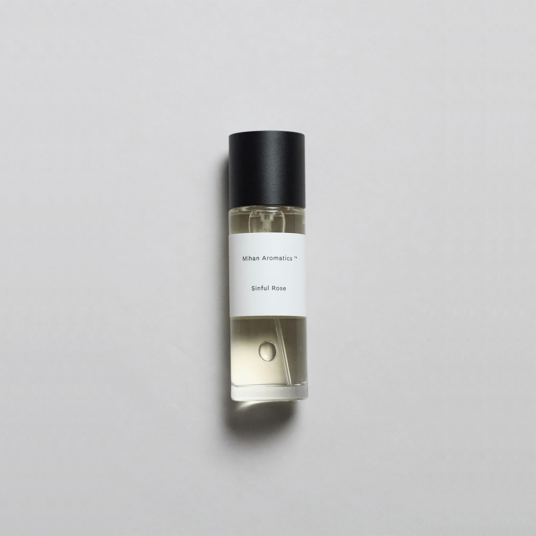 Bottle of Sinful Rose Parfum by Mihan Aromatics, featuring a sleek design and warm, intimate fragrance.