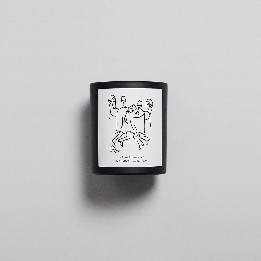 Guilty Story Candle by Mihan Aromatics, black container with minimalist art, hand-poured soy wax, 60-hour burn time.