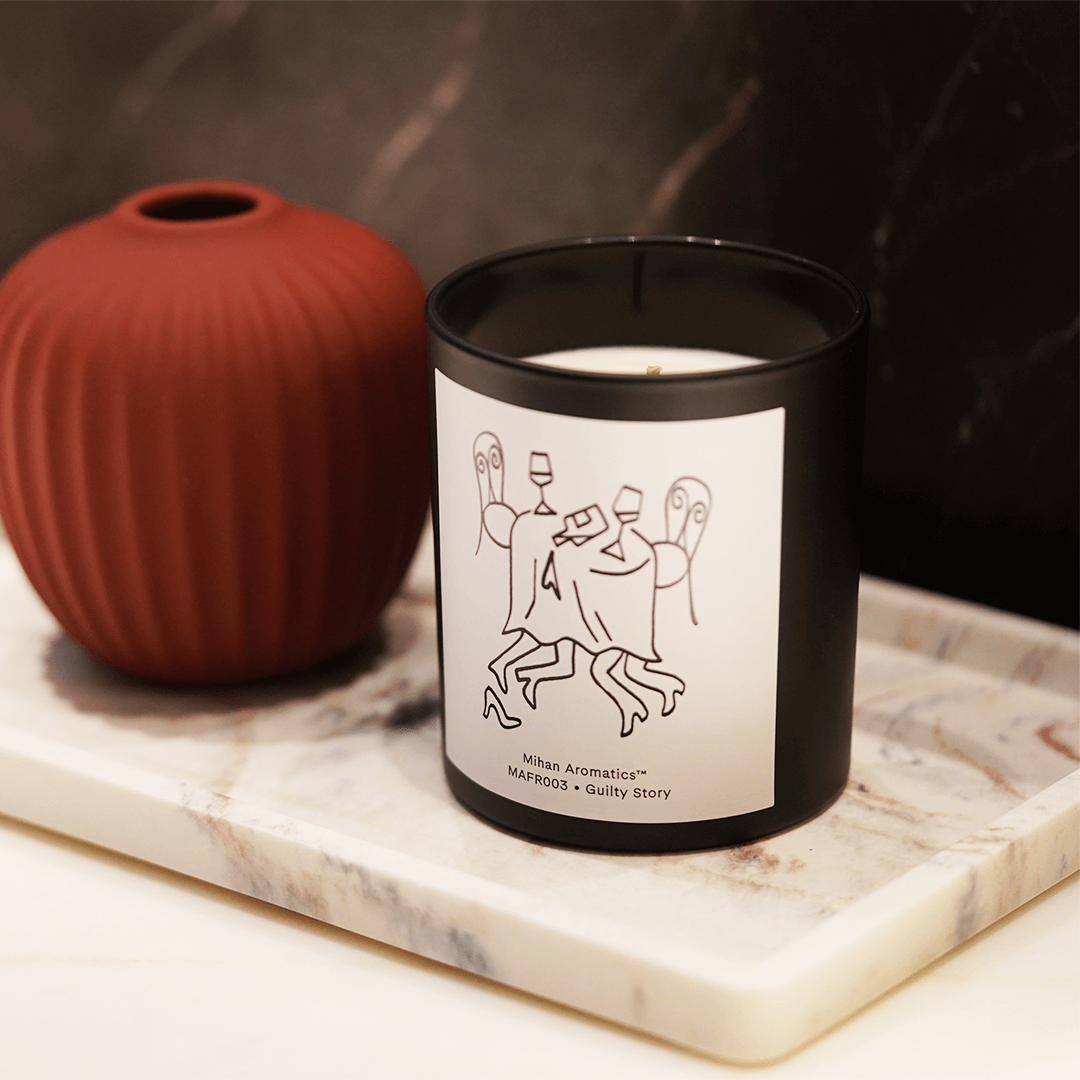 Guilty Story Candle by Mihan Aromatics, hand-poured soy wax candle with elegant design, 60-hour burn time.