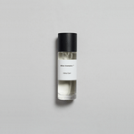 Kirra Curl Parfum by Mihan Aromatics in sleek glass bottle on a neutral background.