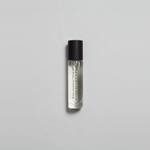 Kirra Curl Parfum by Mihan Aromatics in a sleek roll-on bottle, evoking sun-kissed beach vibes and nostalgia.