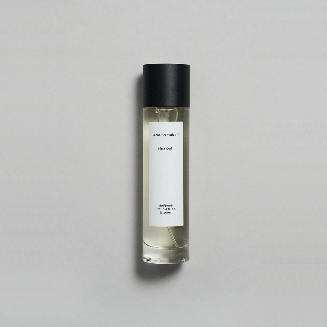 Bottle of Kirra Curl Parfum by Mihan Aromatics, evoking beach vibes and nostalgia with a minimalist design.