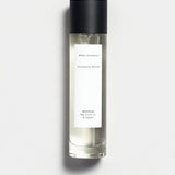 Mihan Aromatics Eucalyptus Bloom parfum 100ml bottle with black cap on a Studio Grey backdrop
