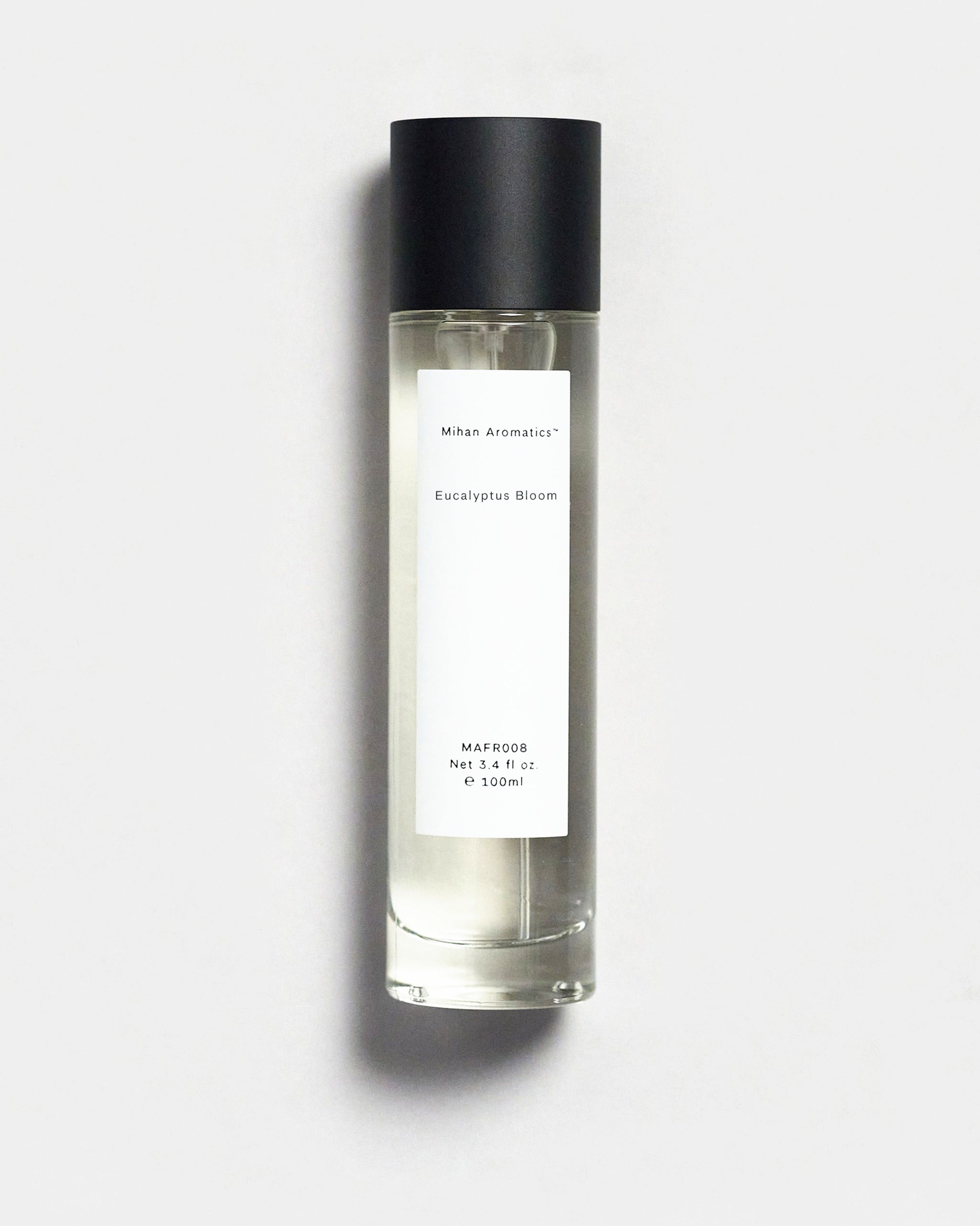 Mihan Aromatics Eucalyptus Bloom parfum 100ml bottle with black cap on a Studio Grey backdrop