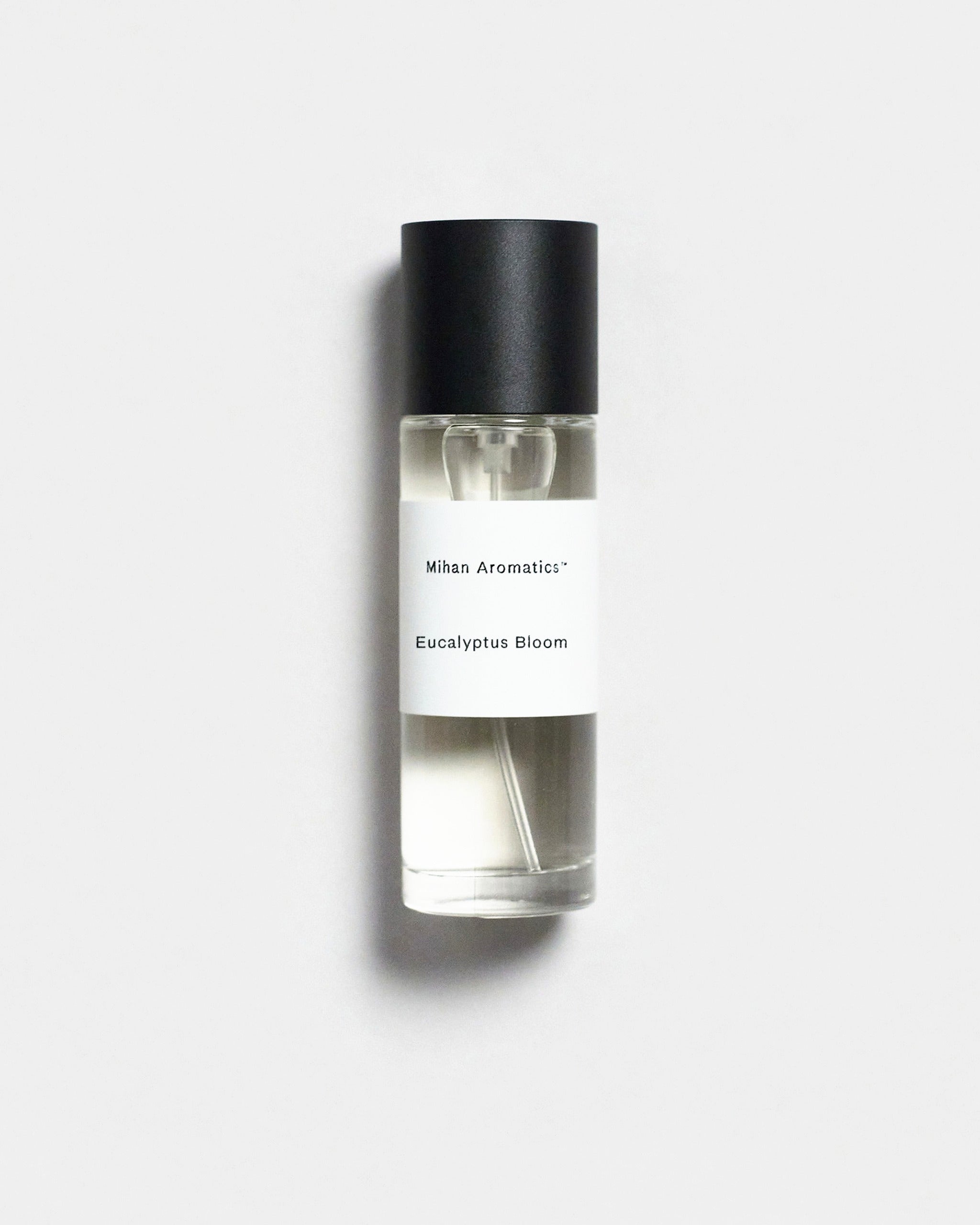 Mihan Aromatics Eucalyptus Bloom parfum 30ml bottle with black cap on a Studio Grey backdrop