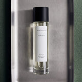 Mihan Aromatics Guilty Story parfum 100ml bottle on a steel tray