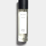 Mihan Aromatics Guilty Story parfum 100ml bottle with black cap on a Studio Grey backdrop