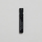 Mihan Aromatics Guilty Story parfum 2ml sample vial on a pale grey backdrop