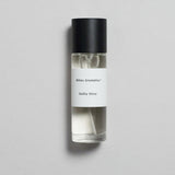 Mihan Aromatics Guilty Story parfum 30ml bottle with black cap on a pale grey backdrop