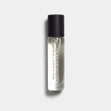 Mihan Aromatics Kirra Curl parfum 10ml bottle with black cap on a Studio Grey backdrop