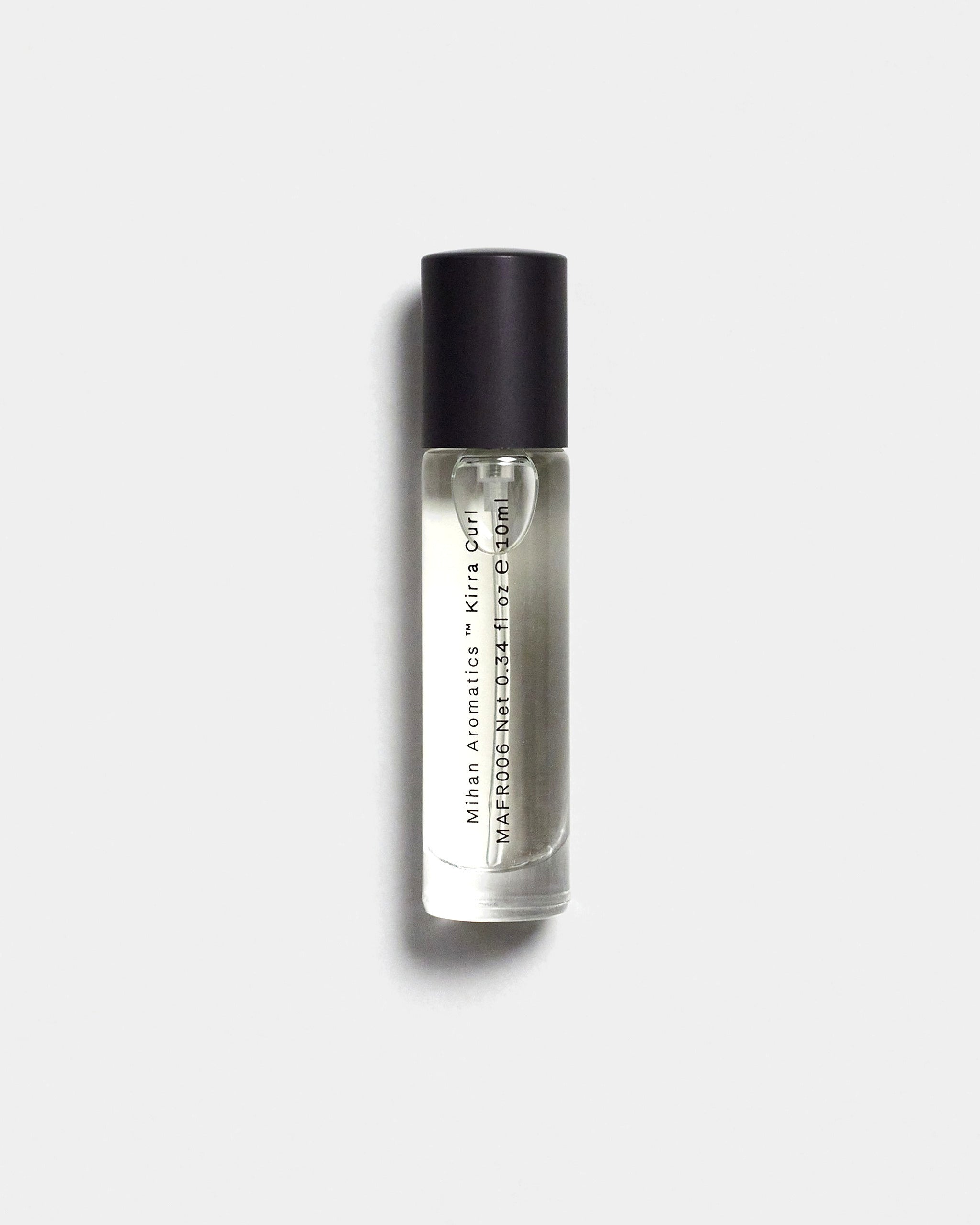 Mihan Aromatics Kirra Curl parfum 10ml bottle with black cap on a Studio Grey backdrop
