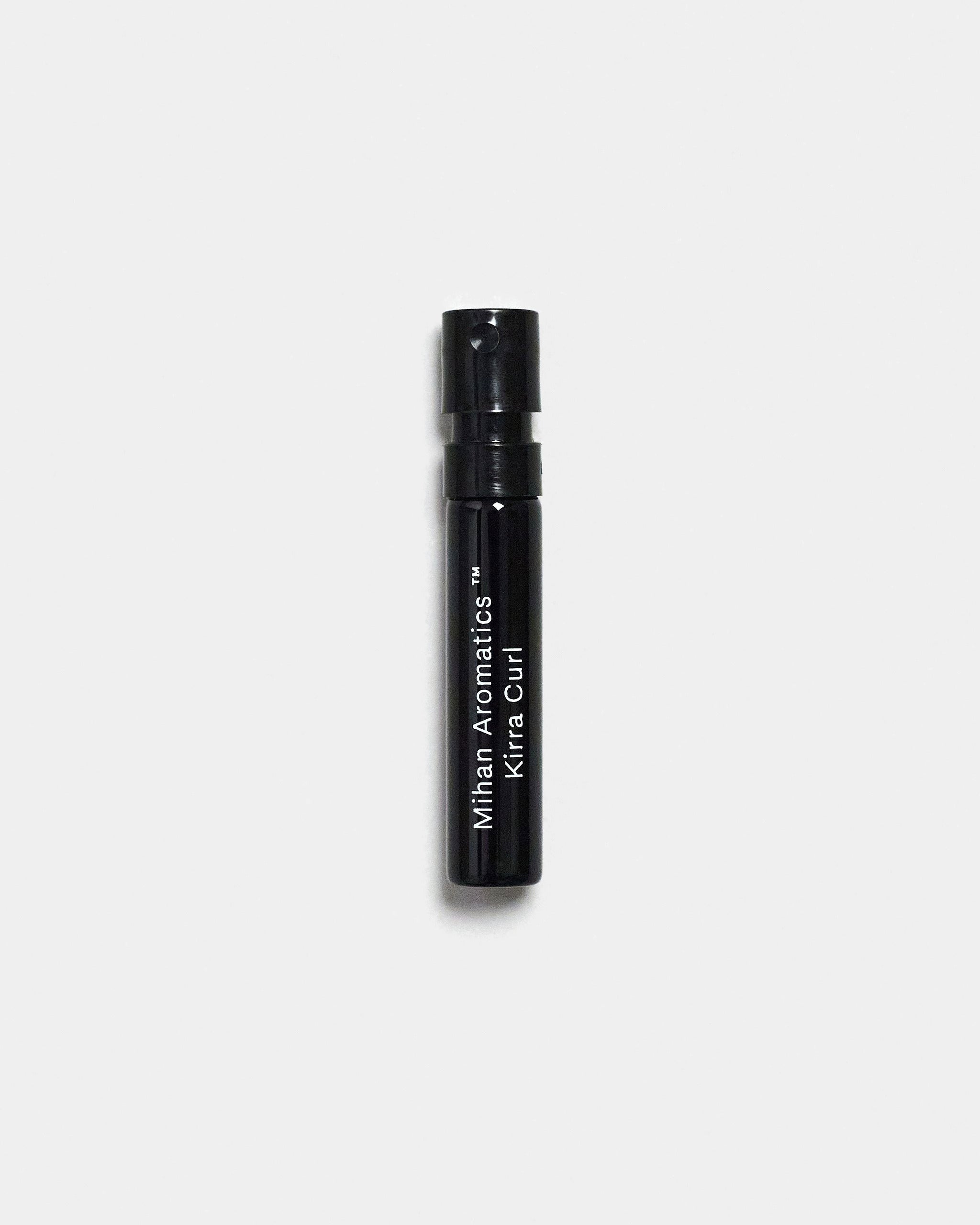 Mihan Aromatics Kirra Curl parfum 2ml sample vial on a Studio Grey backdrop