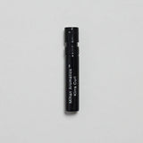 Mihan Aromatics Kirra Curl parfum 2ml sample vial on a pale grey backdrop