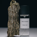 Mihan Aromatics Mikado Bark parfum 100ml bottle standing against tree bark