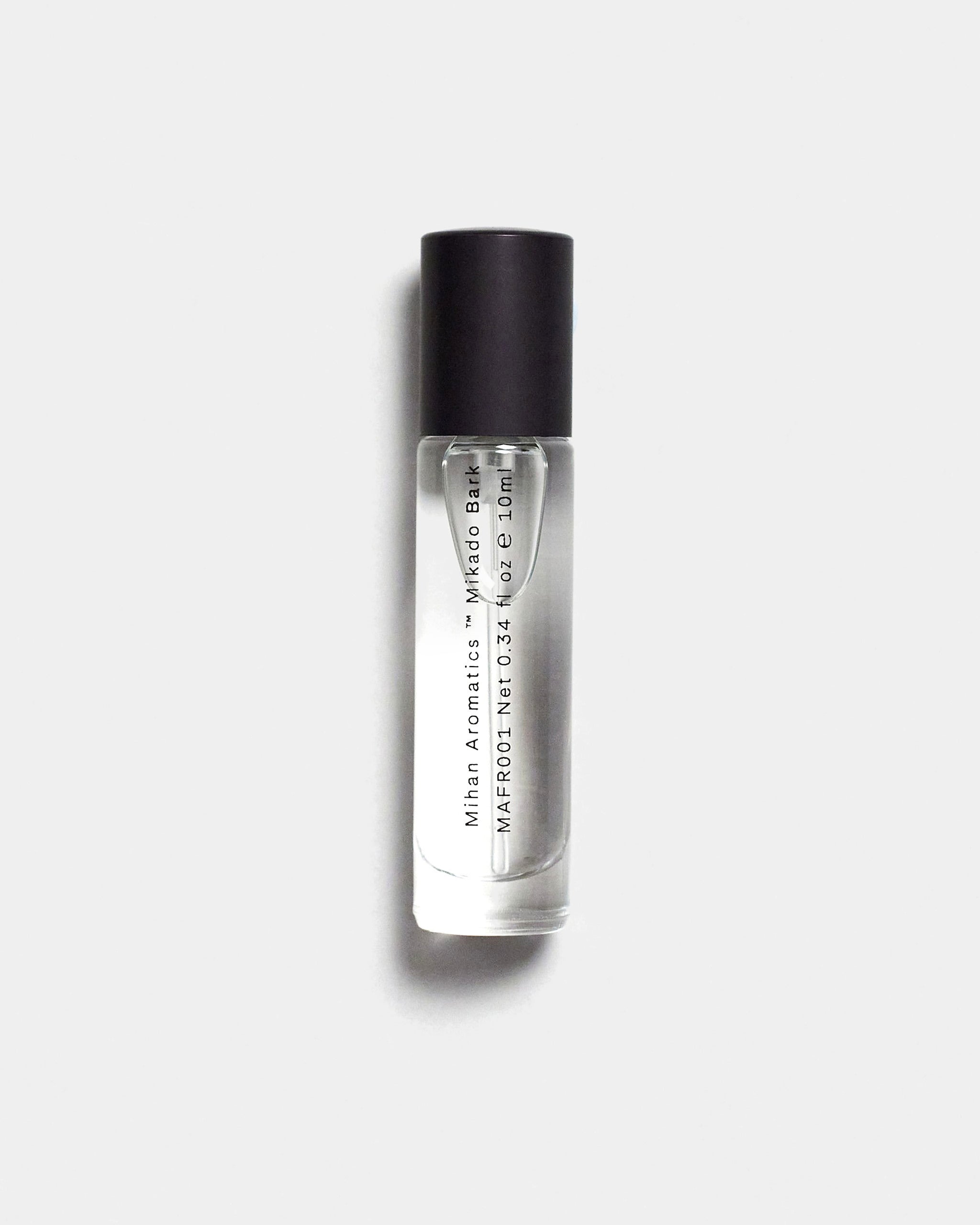 Mihan Aromatics Mikado Bark parfum 10ml bottle with black cap on a Studio Grey backdrop