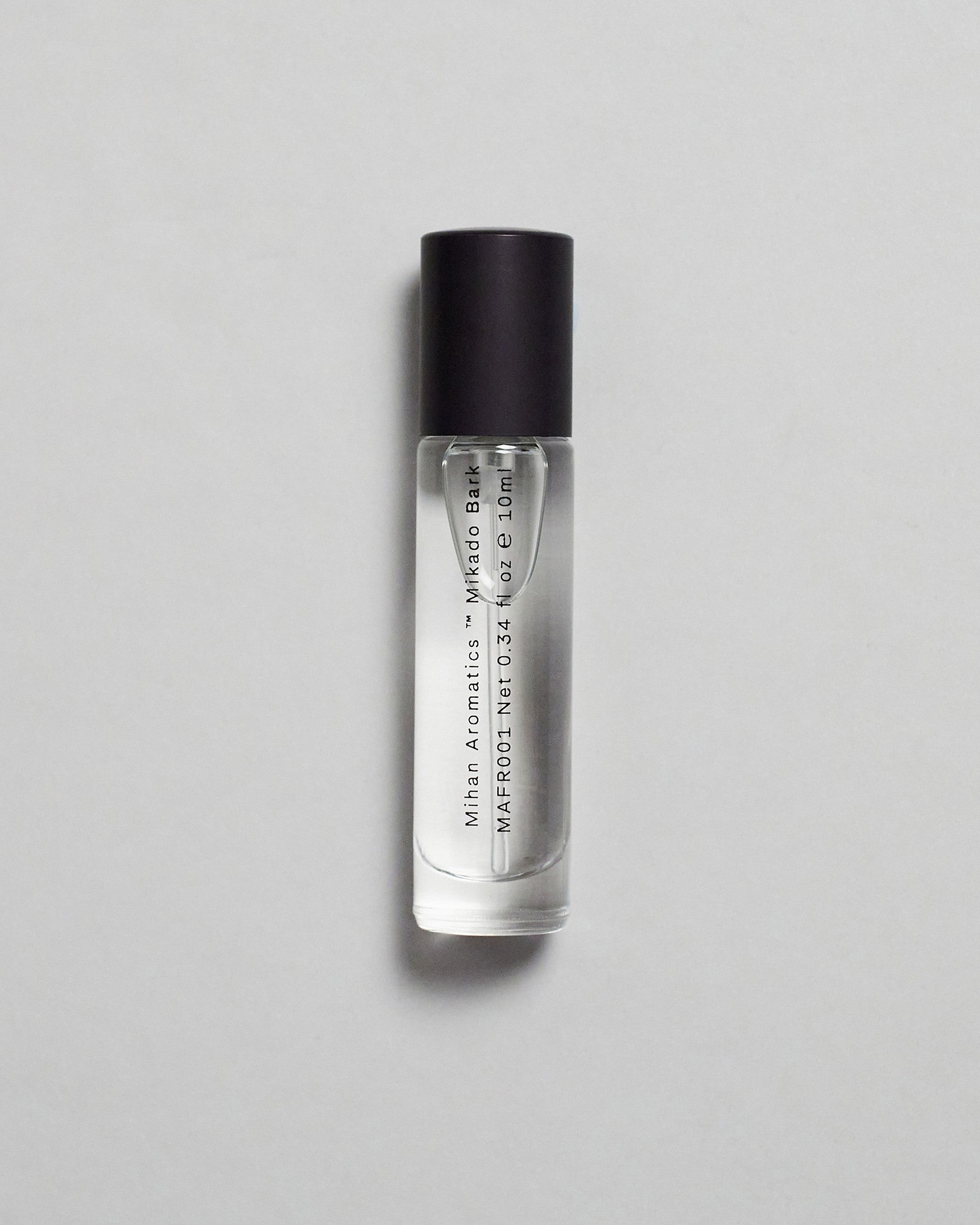 Mihan Aromatics Mikado Bark parfum 10ml bottle with black cap on a pale grey backdrop