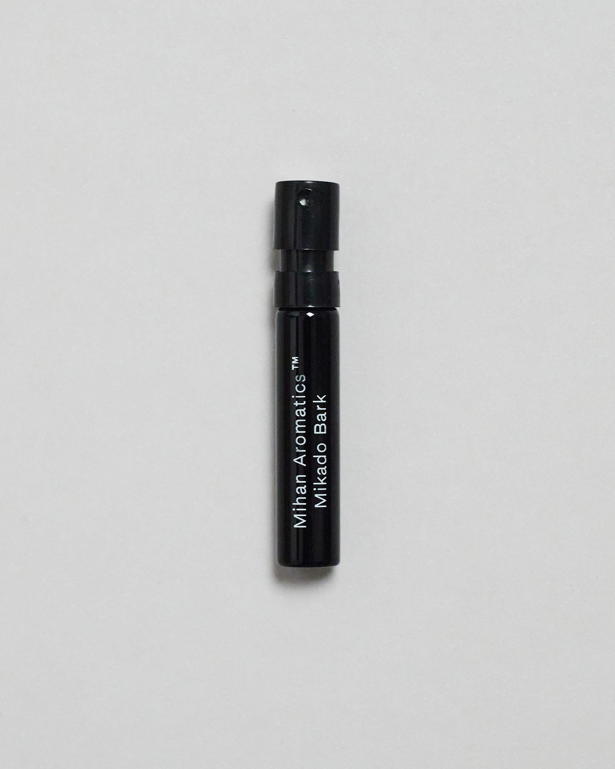 Mihan Aromatics Mikado Bark parfum 2ml sample vial on a pale grey backdrop