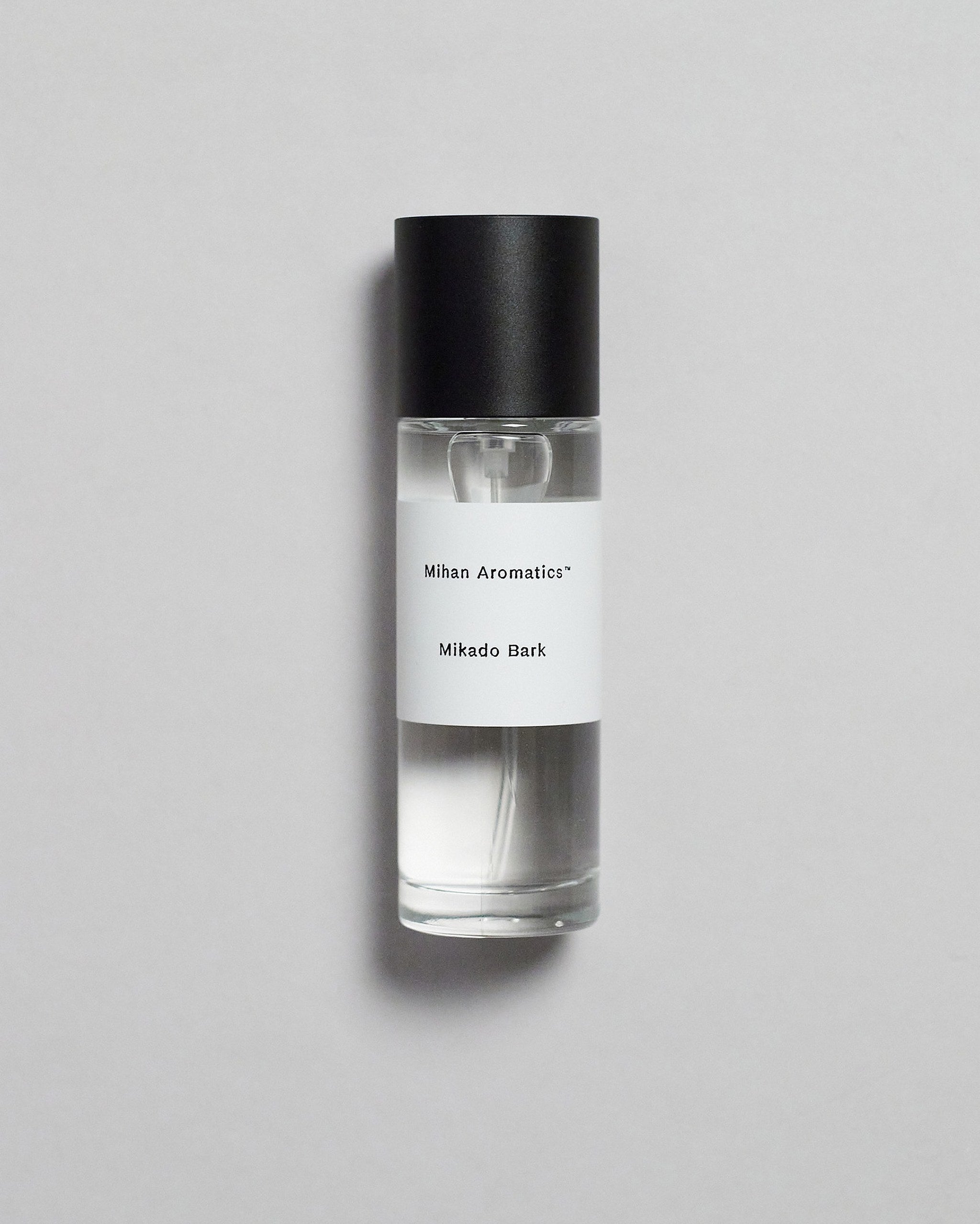 Mihan Aromatics Mikado Bark parfum 30ml bottle with black cap on a pale grey backdrop