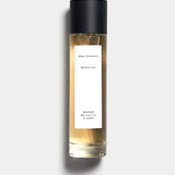 Mihan Aromatics Munlark Ash parfum 100ml bottle with black cap on a Studio Grey backdrop