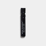 Mihan Aromatics Munlark Ash parfum 2ml sample vial on a Studio Grey backdrop