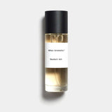 Mihan Aromatics Munlark Ash parfum 30ml bottle with black cap on a Studio Grey backdrop