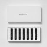 Mihan Aromatics parfum Discovery Set, open box holding seven 2ml vials beside its lid
