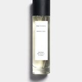 Mihan Aromatics Petrichor Plains parfum 100ml bottle with black cap on a Studio Grey backdrop