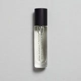 Mihan Aromatics Petrichor Plains parfum 10ml bottle with black cap on a pale grey backdrop