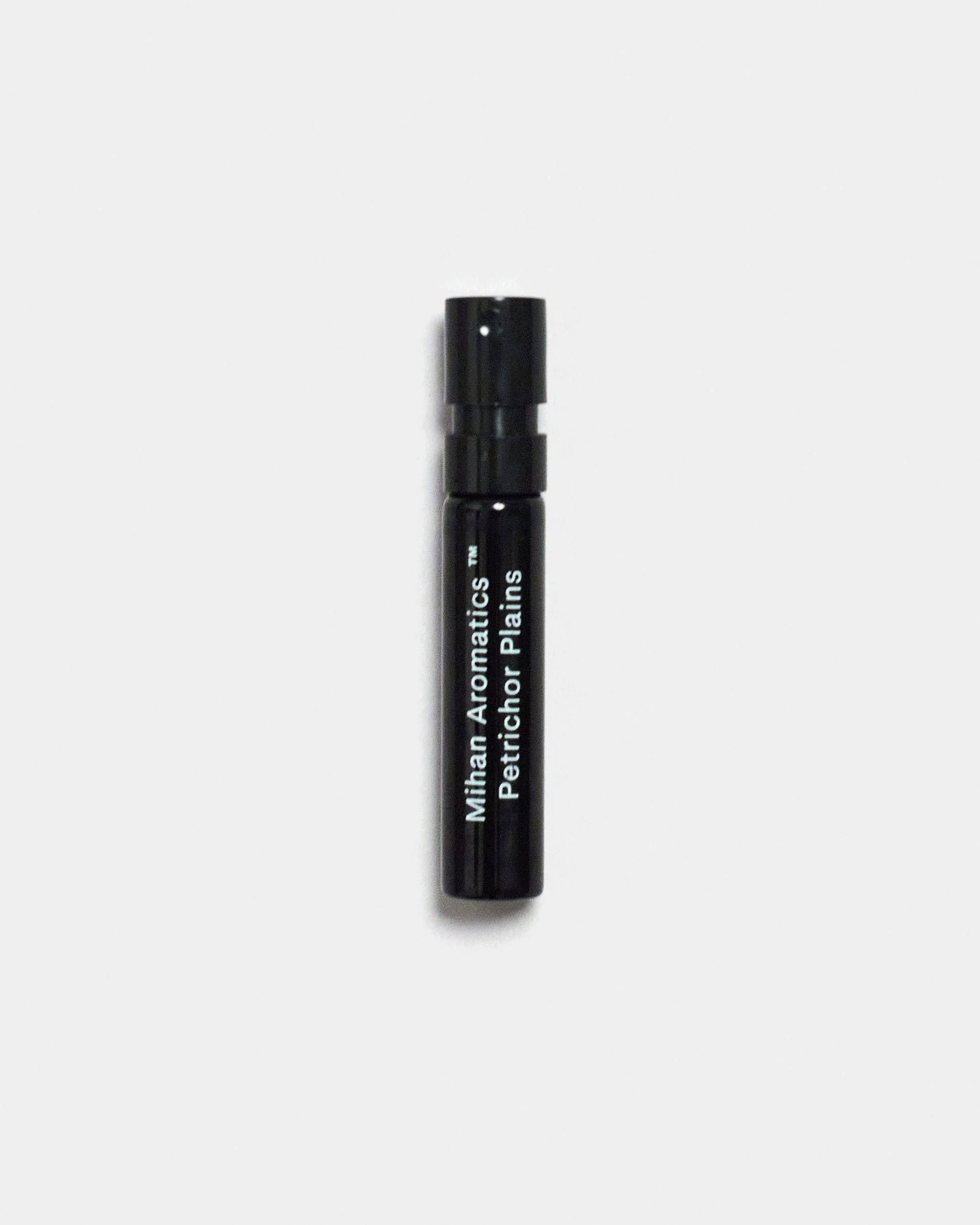 Mihan Aromatics Petrichor Plains parfum 2ml sample vial on a Studio Grey backdrop