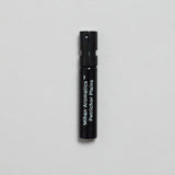 Mihan Aromatics Petrichor Plains parfum 2ml sample vial on a pale grey backdrop