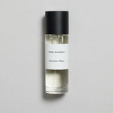 Mihan Aromatics Petrichor Plains parfum 30ml bottle with black cap on a pale grey backdrop