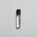 Petrichor Plains Parfum by Mihan Aromatics, capturing the essence of rain on dry earth in a sleek roller bottle.