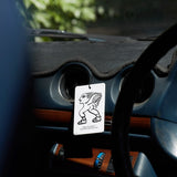 Mihan Aromatics Sienna Brume Air Fragrance hanging from the air vent of a vintage car