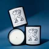 Three Mihan Aromatics Sienna Brume candles stacked together, one showing its white wax