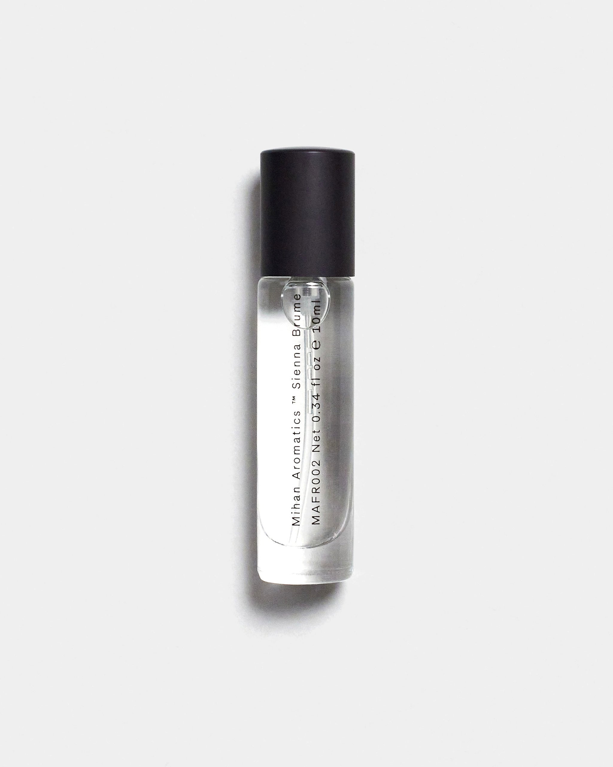 Mihan Aromatics Sienna Brume parfum 10ml bottle with black cap on a Studio Grey backdrop