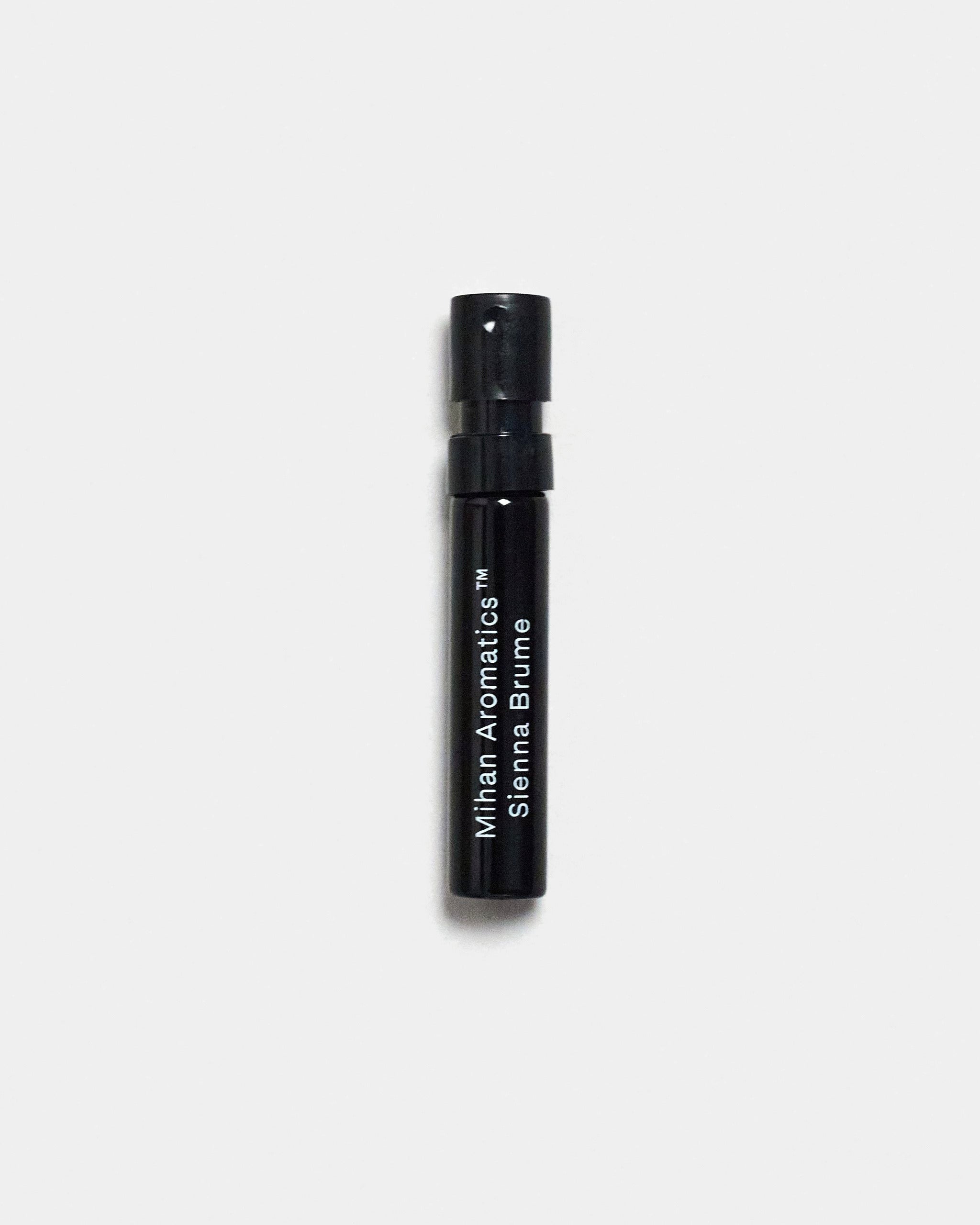 Mihan Aromatics Sienna Brume parfum 2ml sample vial on a Studio Grey backdrop