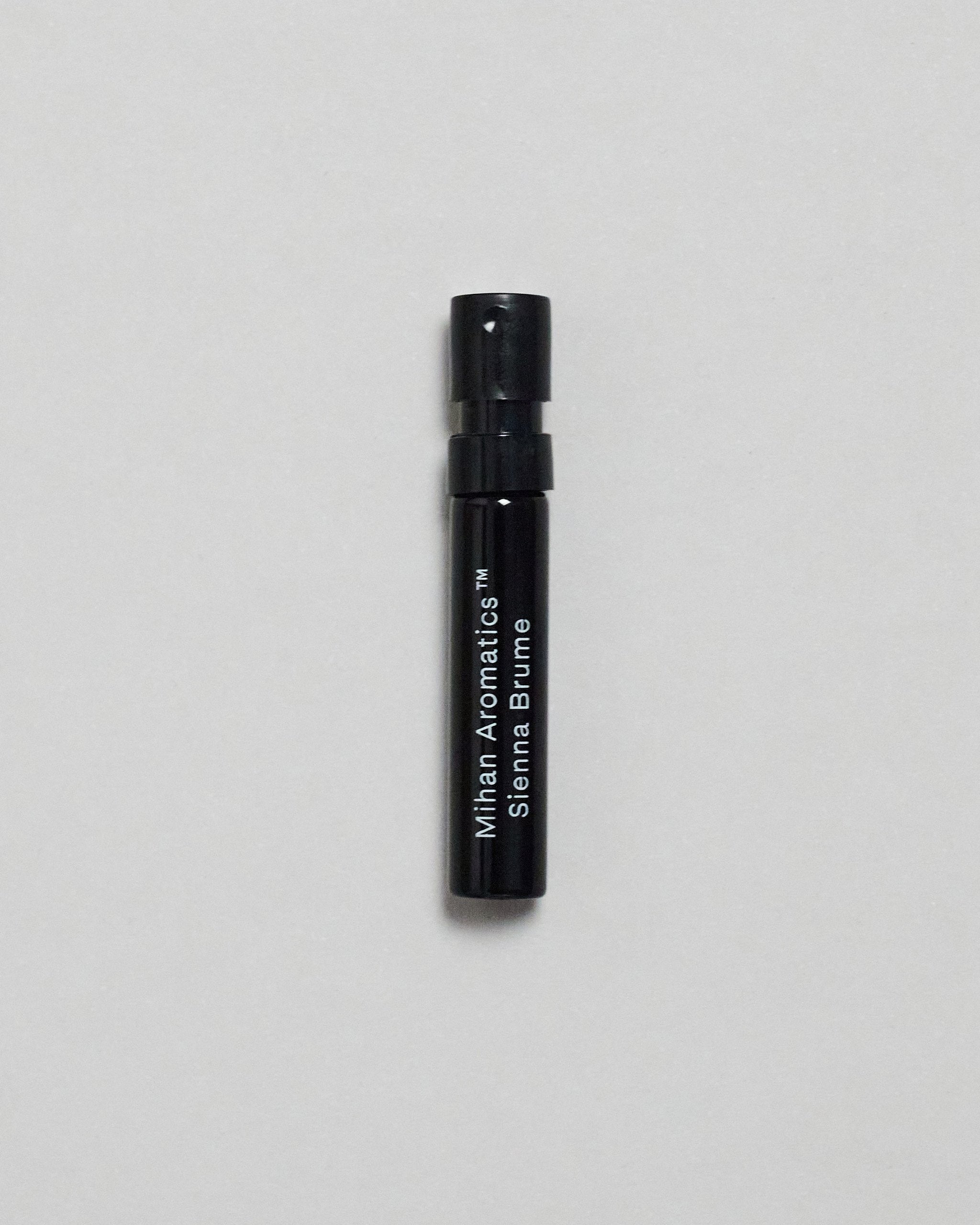 Mihan Aromatics Sienna Brume parfum 2ml sample vial on a pale grey backdrop