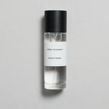 Mihan Aromatics Sienna Brume parfum 30ml bottle with black cap on a pale grey backdrop