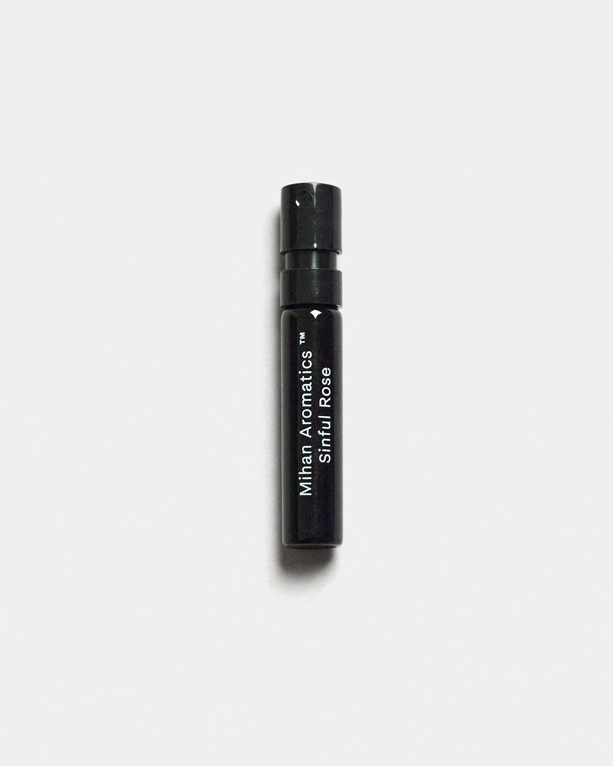 Mihan Aromatics Sinful Rose parfum 2ml sample vial on a Studio Grey backdrop