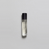 Sinful Rose Parfum by Mihan Aromatics in a sleek bottle, featuring a blend of rose, amber, and oud.