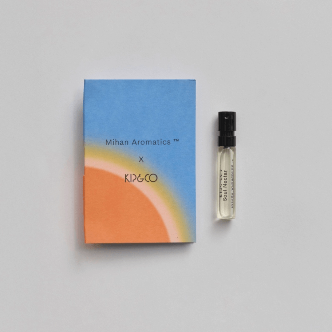Soul Nectar Parfum by Mihan Aromatics and Kip&Co displayed with colorful packaging and a spray vial.