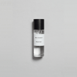 Mikado Bark Parfum bottle, showcasing crisp air and autumn park ambiance in a minimalist design.