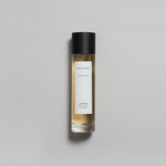Munlark Ash Parfum by Mihan Aromatics, featuring a minimalist bottle with a simple label and a cool, earthy fragrance.