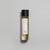 Munlark Ash Parfum by Mihan Aromatics, featuring a minimalist bottle with a simple label and a cool, earthy fragrance.