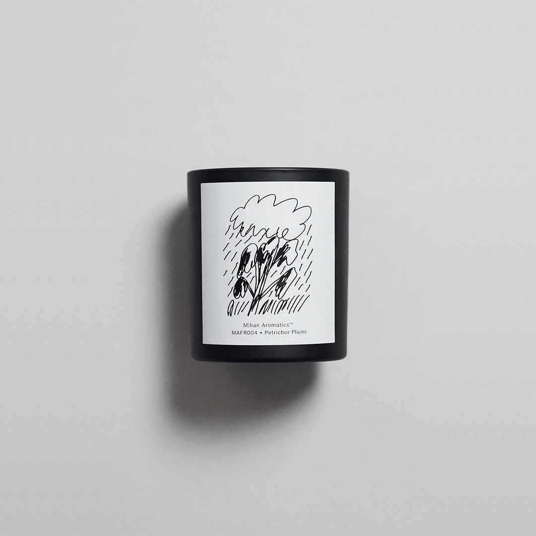 Petrichor Plains Candle by Mihan Aromatics, hand-poured soy wax candle with a unique artistic label.