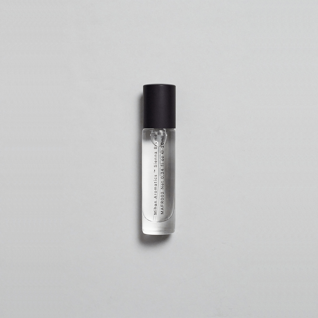 Sienna Brume Parfum bottle, featuring soft coconut and cucumber fragrances for a refreshing summer essence.