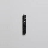 Sinful Rose Parfum by Mihan Aromatics in a sleek black spray vial on a white background.